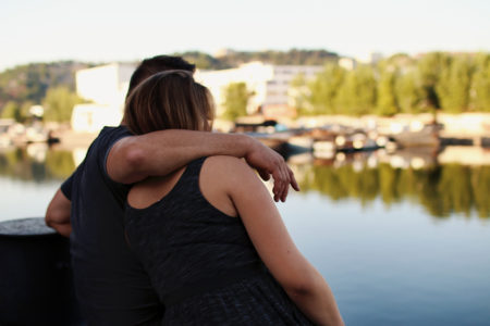 couple hugging after resolving conflict